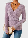 Women's Wrap Knit Top with Deep V-Neck and Decorative Button Detail